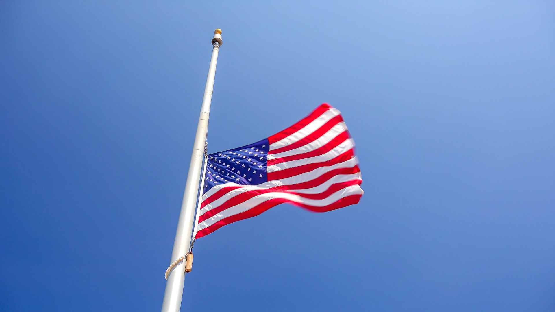 Flags at half-staff to honor FBI special agents Daniel Alfin and Laura Schwartzenberger